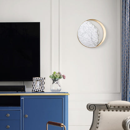 Abreatheofhome marble LED wall lamp adds elegant modern lighting to bedrooms and living spaces. Artistic eclipse design with warm, soft illumination.