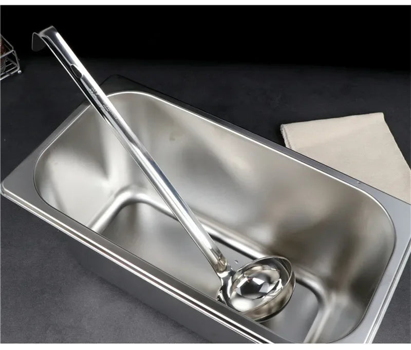 Durable soup ladle – long handle, big round scoop, ideal for kitchen and buffet use.